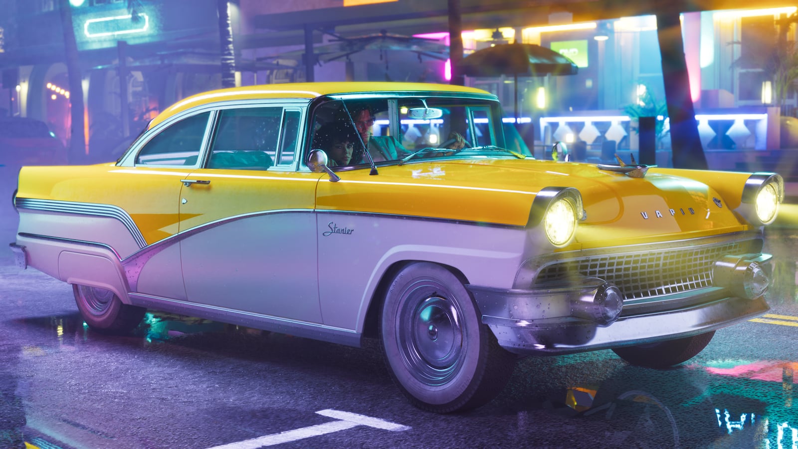 Vapid Stanier 1955, berline bicolore jaune et blanche, dans une rue de Vice City la nuit